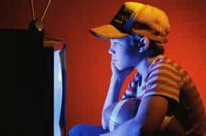 Young boy watching TV